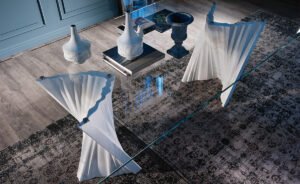 Plisset table de Cattelan Italia associe marbre Palissandro et verre clair dans un design sculptural et raffiné. Disponible chez D-Style Interior.