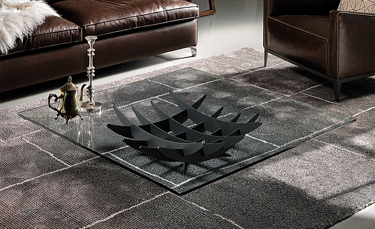 Table basse design haut de gamme Atlas par Cattelan Italia, plateau verre avec base acier méridiens, disponible chez D-Style Interior.